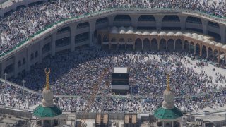 Muslim pilgrims circumambulate the Kaaba, the cubic building at the Grand Mosque, during the annual Hajj pilgrimage in Mecca, Saudi Arabia, Monday, June 17, 2024. More than 1,000 people died during this year’s Hajj pilgrimage in Saudi Arabia as the faithful faced extreme high temperatures at Islamic holy sites in the desert kingdom, officials said Sunday, June 23, 2024.