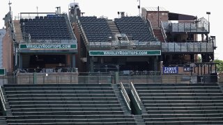 CHICAGO, ILLINOIS – JULY 11: A general view of rooftop decks surrounding at Wrigley Field during a Chicago Cubs summer workout on July 11, 2020 in Chicago, Illinois. A small number of fans will be allowed to watch from these rooftops when games begin on July 24. (Photo by Jonathan Daniel/Getty Images)