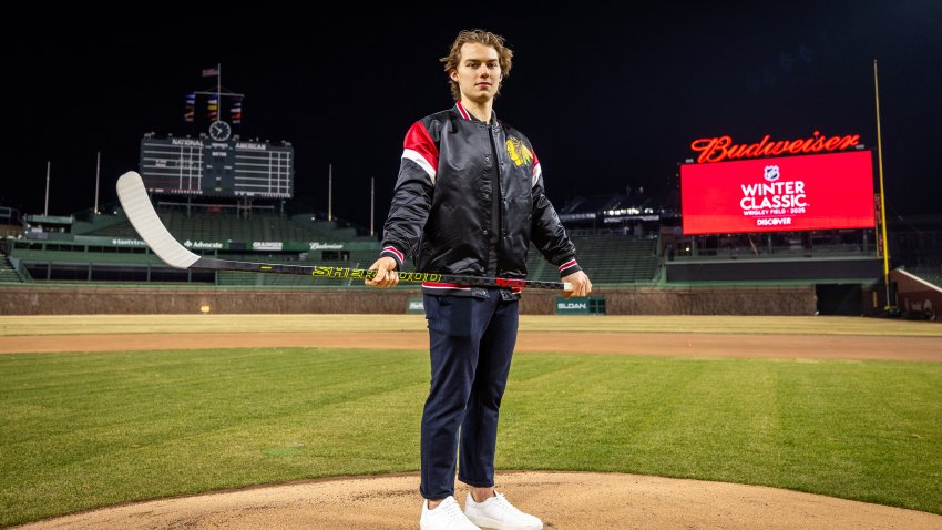 CHICAGO, ILLINOIS – FEBRUARY 07: Connor Bedard #98 of the Chicago Blackhawks poses for a portrait after announcing that the 2025 Discover NHL Winter Classic will feature the Chicago Blackhawks hosting the St. Louis Blues at Wrigley Field on February 07, 2024 in Chicago, Illinois. (Photo by Chase Agnello-Dean/NHLI via Getty Images)