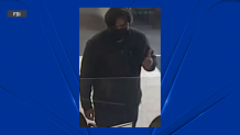 The FBI is searching for the person in the above surveillance photo in connection with an October robbery at a US Bank in Schaumburg. The same suspect is said to be responsible for another robbery at the location and two others at a US Bank in Elmhurst.