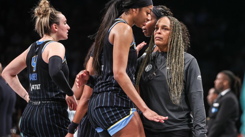 May 23, 2024; Brooklyn, New York, USA;  Chicago Sky forward Angel Reese (5) talks with head coach Teresa Weatherspoon during a time out in the fourth quarter against the New York Liberty at Barclays Center. Mandatory Credit: Wendell Cruz-USA TODAY Sports