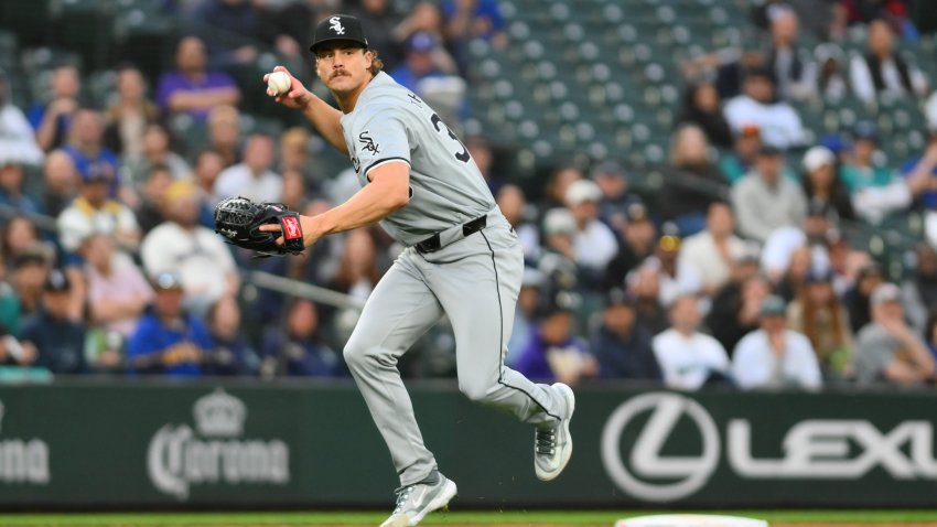 Jun 11, 2024; Seattle, Washington, USA; Chicago White Sox starting pitcher Drew Thorpe (33) throws the ball to first base after fielding a ground ball during the fifth inning at T-Mobile Park. Mandatory Credit: Steven Bisig-USA TODAY Sports