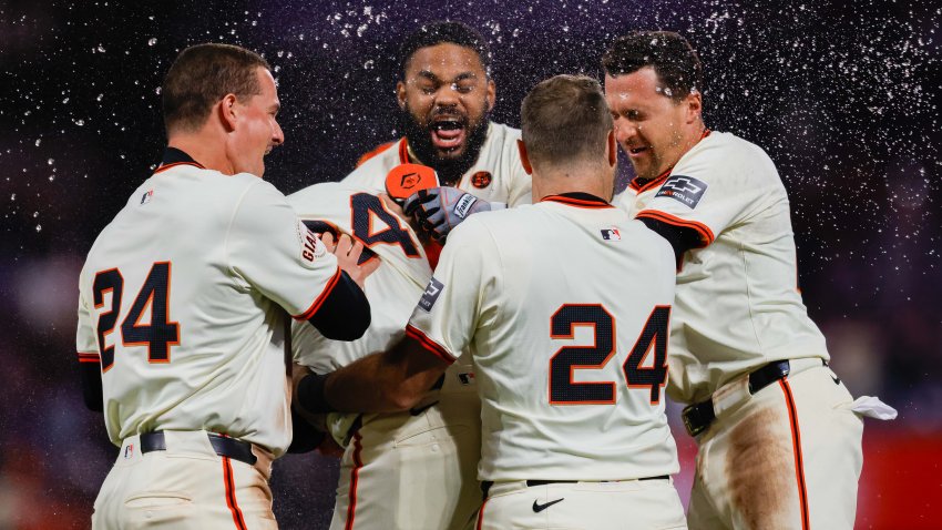 Jun 24, 2024; San Francisco, California, USA; San Francisco Giants players celebrate after the game against the Chicago Cubs at Oracle Park. All Giants players wore the number 24 in honor of Giants former player Willie Mays. Mandatory Credit: Sergio Estrada-USA TODAY Sports