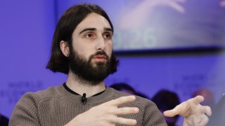 Aidan Gomez, co-founder and chief executive officer of Cohere Inc., during a panel session on the opening day of the World Economic Forum (WEF) in Davos, Switzerland, on Tuesday, Jan. 16, 2024. 