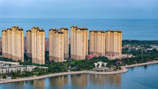 High-rise buildings are being seen in the West Coast New Area of Qingdao, Shandong province, China, on July 6, 2024.