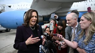 Vice President Kamala Harris speaks to reporters upon arrival at Joint Base Andrews in Maryland on July 25, 2024.