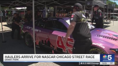 Haulers drop off vehicles ahead of NASCAR Chicago Street Race