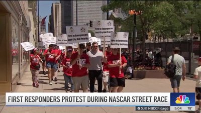 Chicago firefighters march for new contract during NASCAR Street Race
