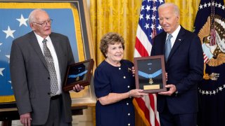 President Joe Biden presents the Medal of Honor to Theresa Chandler, the great great granddaughter of Pvt. George D. Wilson in the East Room at the White House in Washington, Wednesday, July 3, 2024.