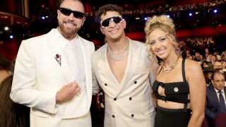 FILE - (L-R) Travis Kelce, Patrick Mahomes and Brittany Mahomes