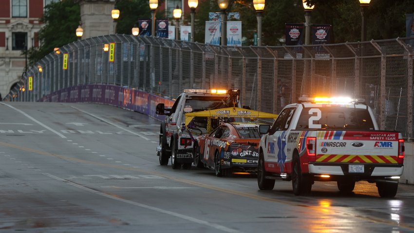 CHICAGO, ILLINOIS – JULY 07: The #16 Wendy’s Saucy Nuggs Chevrolet, driven by Shane Van Gisbergen is towed off track after an incident during the NASCAR Cup Series Grant Park 165 at Chicago Street Course on July 07, 2024 in Chicago, Illinois. (Photo by Meg Oliphant/Getty Images)