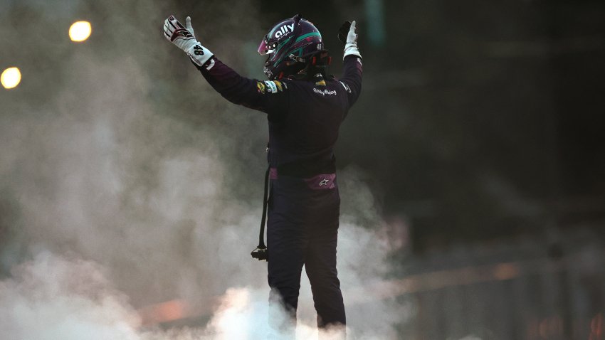 CHICAGO, ILLINOIS – JULY 07: Alex Bowman, driver of the #48 Ally Chevrolet, celebrates after winning the NASCAR Cup Series Grant Park 165 at Chicago Street Course on July 07, 2024 in Chicago, Illinois. (Photo by James Gilbert/Getty Images)