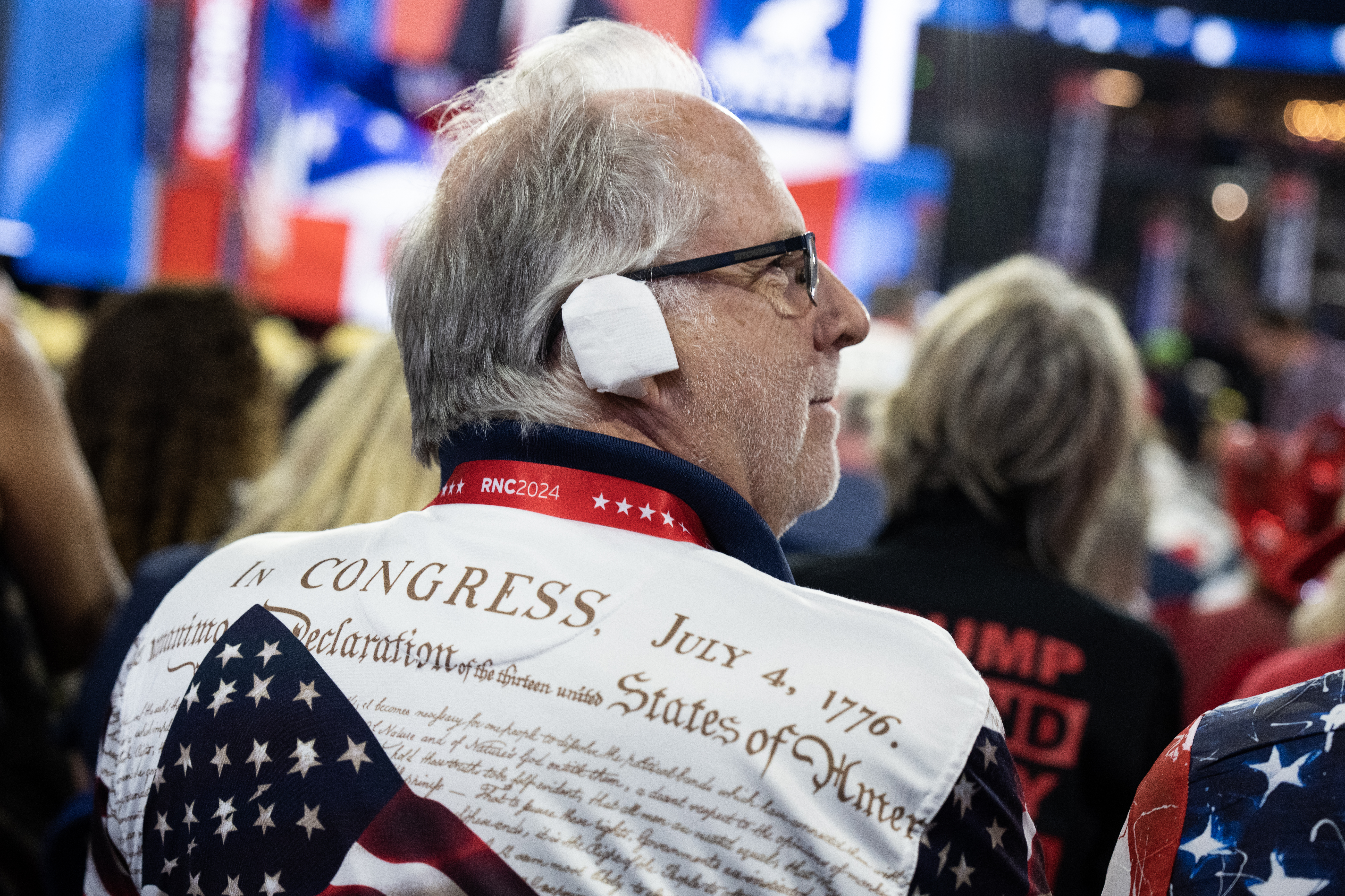 WASHINGTON – JULY 17: An Arizona delegate wears an ear bandage in solidarity with Donald Trump, the Republican presidential nominee, in the Fiserv Forum on the third night of the Republican National Convention in Milwaukee, Wis., on Wednesday July 17, 2024. (Tom Williams/CQ-Roll Call, Inc via Getty Images)