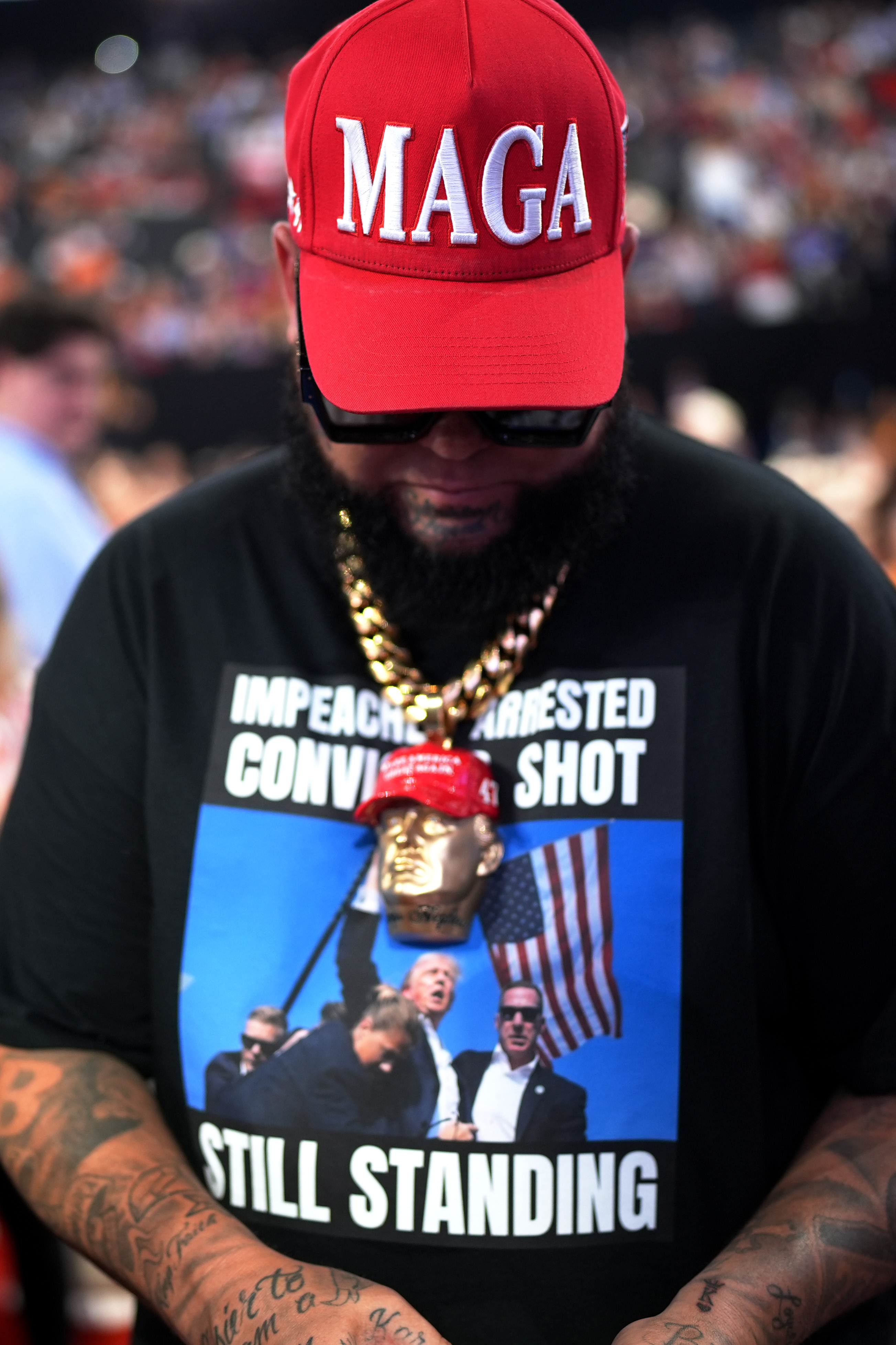 MILWAUKEE, WISCONSIN – JULY 15: Rapper Forgiato Blow stands in the crowd on the first day of the Republican National Convention at the Fiserv Forum on July 15, 2024 in Milwaukee, Wisconsin. Delegates, politicians, and the Republican faithful are in Milwaukee for the annual convention, concluding with former President Donald Trump accepting his party’s presidential nomination. The RNC takes place from July 15-18. (Photo by Andrew Harnik/Getty Images)