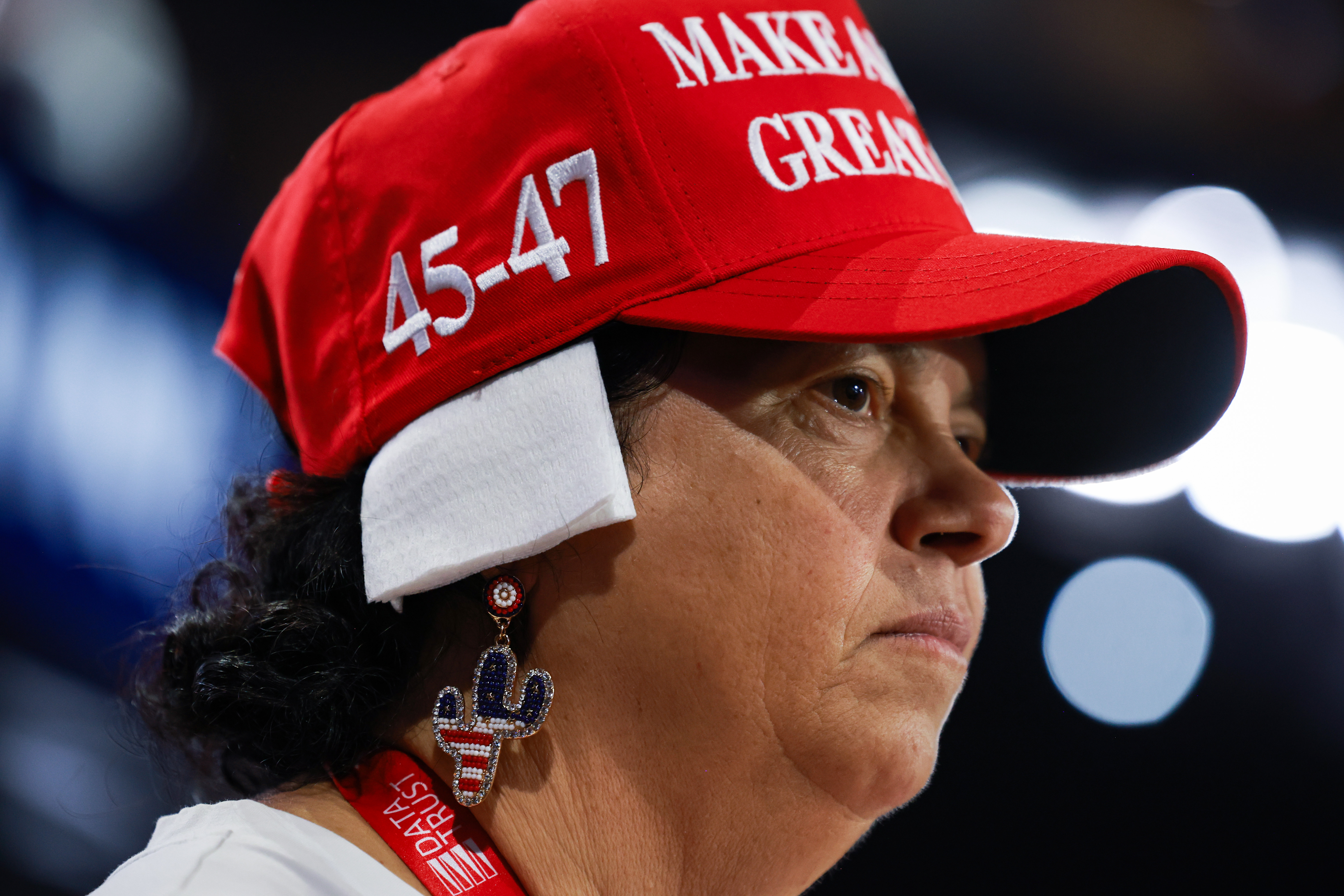 MILWAUKEE, WISCONSIN – JULY 17: Arizona delegate Stacy Goodman wears a ‘bandage’ on her ear on the third day of the Republican National Convention at the Fiserv Forum on July 17, 2024 in Milwaukee, Wisconsin. Delegates, politicians, and the Republican faithful are in Milwaukee for the annual convention, concluding with former President Donald Trump accepting his party’s presidential nomination. The RNC takes place from July 15-18.  (Photo by Joe Raedle/Getty Images)