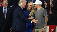 MILWAUKEE, WISCONSIN - JULY 18: Republican presidential candidate, former U.S. President Donald Trump greets country music artist Jason Aldean (R) and his wife, Brittany Aldean (C) as he arrives on the fourth day of the Republican National Convention at the Fiserv Forum on July 18, 2024 in Milwaukee, Wisconsin. Delegates, politicians, and the Republican faithful are in Milwaukee for the annual convention, concluding with former President Donald Trump accepting his party's presidential nomination. The RNC takes place from July 15-18. (Photo by Leon Neal/Getty Images)