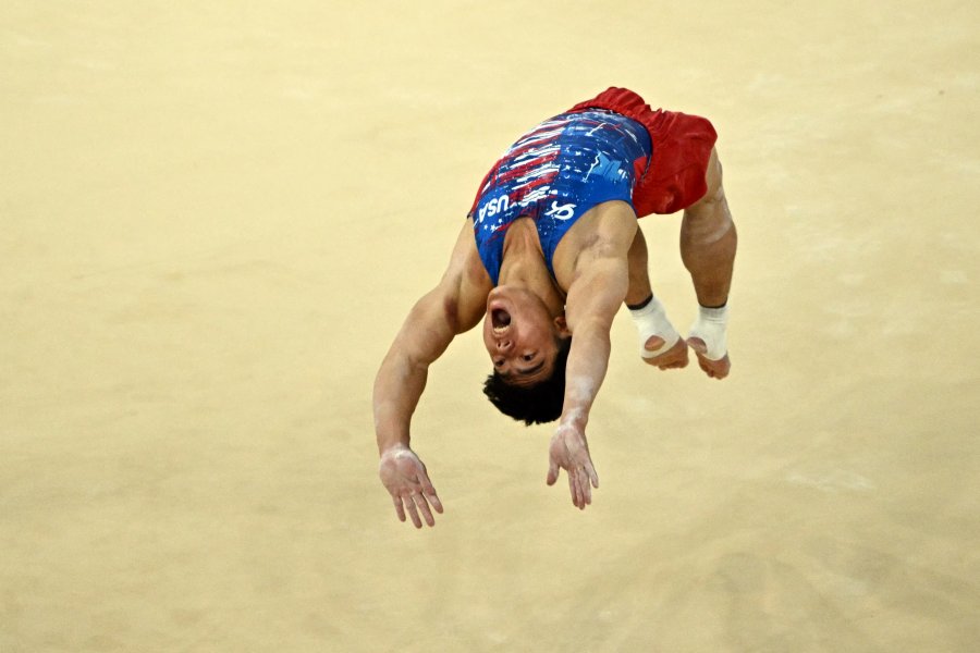 Asher Hong competes in the floor event of the artistic gymnastics