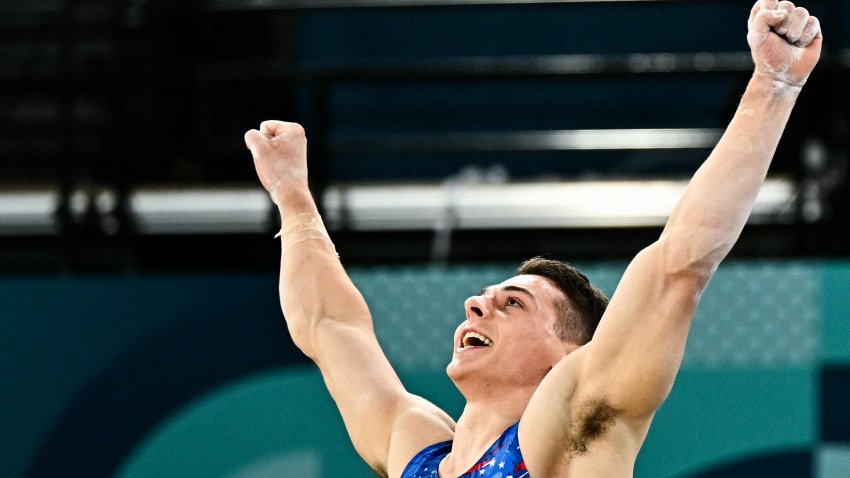 US’ Paul Juda competes in the floor event of the artistic gymnastics men’s qualification during the Paris 2024 Olympic Games at the Bercy Arena in Paris, on July 27, 2024. (Photo by Gabriel BOUYS / AFP) (Photo by GABRIEL BOUYS/AFP via Getty Images)