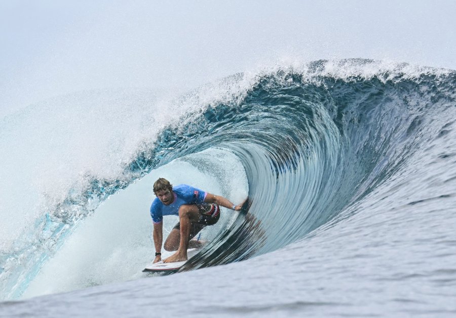 US' John John Florence gets a barrel in the 6th heat of the men's surfing