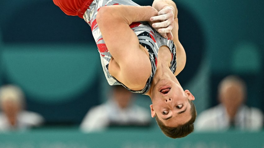 US’ Paul Juda competes in the floor event of the artistic gymnastics men’s team final during the Paris 2024 Olympic Games at the Bercy Arena in Paris, on July 29, 2024. (Photo by Gabriel BOUYS / AFP) (Photo by GABRIEL BOUYS/AFP via Getty Images)
