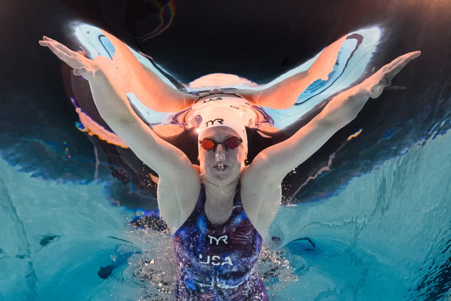 An underwater view shows US' Lilly King competing in a heat of the women's 200m breaststroke swimming event during the Paris 2024 Olympic Games at the Paris La Defense Arena in Nanterre, west of Paris, on July 31, 2024