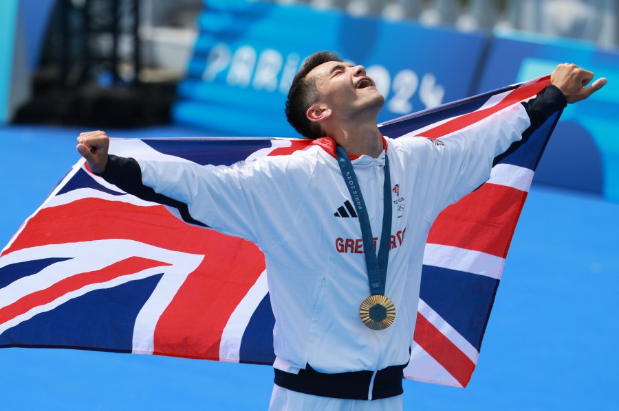 Great Britain's Alex Yee after winning the gold medal in men's triathlon