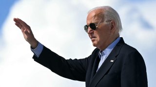 File. US President Joe Biden waves as he boards Air Force One prior to departure from Dane County Regional Airport in Madison, Wisconsin, July 5, 2024, as he travels to Wisconsin for campaign events. (Photo by SAUL LOEB / AFP) (Photo by SAUL LOEB/AFP via Getty Images)