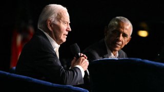 US President Joe Biden (L) speaks next to former US President Barack Obama onstage during a campaign fundraiser at the Peacock Theater in Los Angeles on June 15, 2024. (Photo by Mandel NGAN / AFP) (Photo by MANDEL NGAN/AFP via Getty Images)