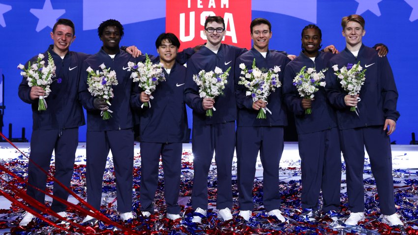 Jun 29, 2024; Minneapolis, Minnesota, USA; Paul Juda, Frederick Richard, Asher Hong, Stephen Nedoroscik, Brody Malone, Khoi Young and Shane Wiskus pose after being selected 2024 U.S. Olympic Men’s gymnastics team during the U.S. Olympic Team Gymnastics Trials at Target Center. Mandatory Credit: Matt Krohn-USA TODAY Sports