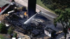 Massive fire destroys barn in suburban Woodstock, officials say