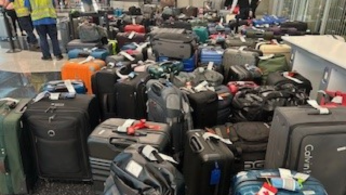 Baggage piles up at O’Hare Airport as massive outage fouls up flights