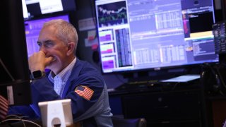 Traders work on the floor of the New York Stock Exchange during afternoon trading on April 09, 2024 in New York City. 