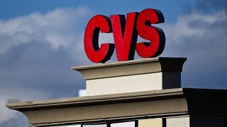 The CVS pharmacy logo is displayed on a sign above a CVS Health Corp. store in Las Vegas, Nevada on Feb. 7, 2024.