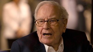 Warren Buffett walks the floor ahead of the Berkshire Hathaway Annual Shareholders Meeting in Omaha, Nebraska, on May 3, 2024.