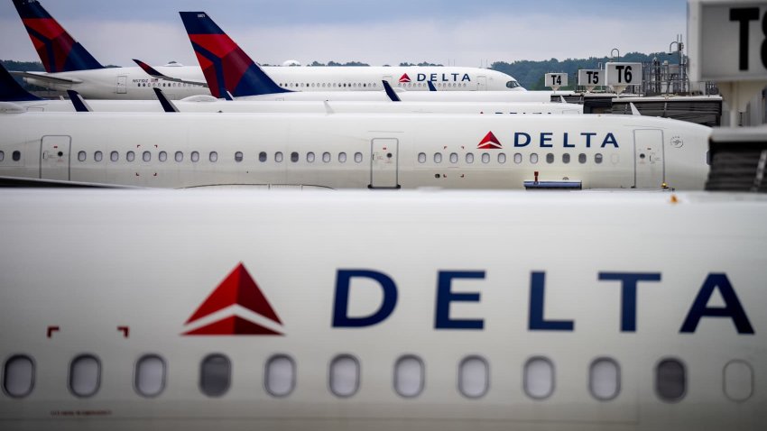 Delta Air Lines planes sit parked at Hartsfield-Jackson Atlanta International Airport in Atlanta on June 28, 2024.