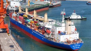 Cargo ships loaded with cars and containers for export are departing at the port of Yantai in Yantai, China, on July 31, 2024.