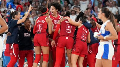 USA women's basketball hangs on to win gold