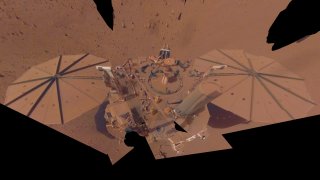 FILE – This image provided by NASA shows the InSight Mars lander in a selfie photo composite on April 24, 2022, the 1,211th Martian day, or sol, of the mission.