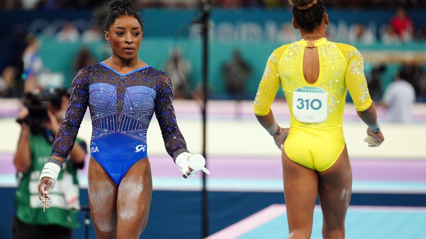 Brazil’s Rebeca Andrade (right) and USA’s Simone Biles during the Women’s All-Around Final at the Bercy Arena on the sixth day of the 2024 Paris Olympic Games in France. Picture date: Thursday August 1, 2024. (Photo by Mike Egerton/PA Images via Getty Images)