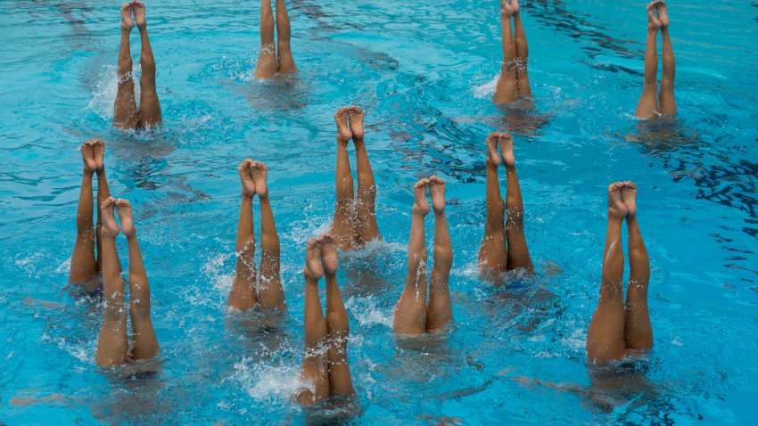 LOS ANGELES, CA – MAY 14: The U.S. artistic swimming team practices a choreographed routine at the LA84 Foundation Swim Stadium. (Photo by Julia Wall for The Washington Post via Getty Images)