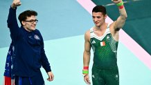 Worcester native Stephen Nedoroscik, left, and Ireland's Rhys Mc Clenaghan celebrate after winning bronze and gold, respectively, in the men's pommel horse final at the Bercy Arena in Paris on Saturday, Aug. 3, 2024, during the 2024 Paris Olympic Games.