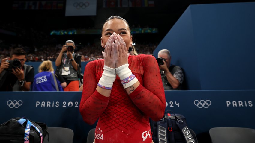 PARIS, FRANCE – AUGUST 04: Sunisa Lee of Team United States celebrates winning the Bronze medal during the Artistic Gymnastics Women’s Uneven Bars Final on day nine of the Olympic Games Paris 2024 at Bercy Arena on August 04, 2024 in Paris, France. (Photo by Jamie Squire/Getty Images)