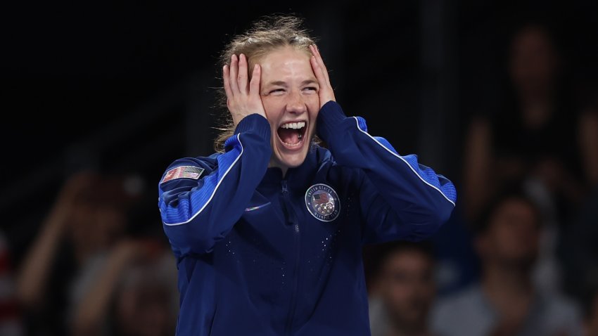 PARIS, FRANCE – AUGUST 07: Gold medalist Sarah Ann Hilderbrandt of Team United States celebrates on the podium during the Wrestling Women’s Freestyle 50kg medal ceremony on day twelve of the Olympic Games Paris 2024 at Champs-de-Mars Arena on August 07, 2024 in Paris, France. (Photo by Sarah Stier/Getty Images)