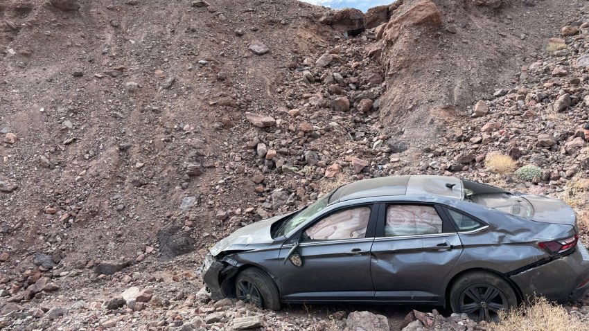 Peter Hayes Robino’s car after rolling down an embankment in Death Valley, California.