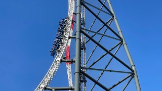 Riders on Cedar Point’s Top Thrill 2 coaster make their way up the 420-foot-tall tower.