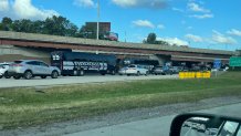 At the Lawrence exit on the Kennedy expressway on Aug. 20, 2024, where coach buses associated with the DNC in Chicago wait to merge onto the express lanes. Norma passenger vehicles were not allowed through.