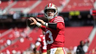 Brock Purdy #13 of the San Francisco 49ers passes as he warms up prior to an NFL football game between the San Francisco 49ers and the Arizona Cardinals at Levi’s Stadium on October 01, 2023 in Santa Clara, California.