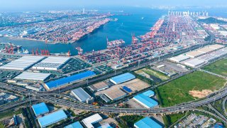 Container ships dock to load and unload containers at Qianwan Container Terminal of Qingdao Port in Qingdao, China, on August 29, 2024.