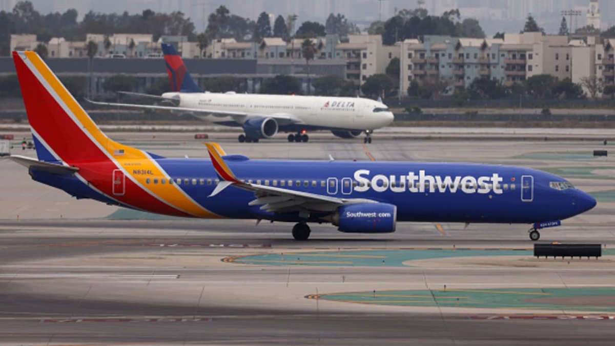 When will Southwest Airlines charge for bags, change seating policies?