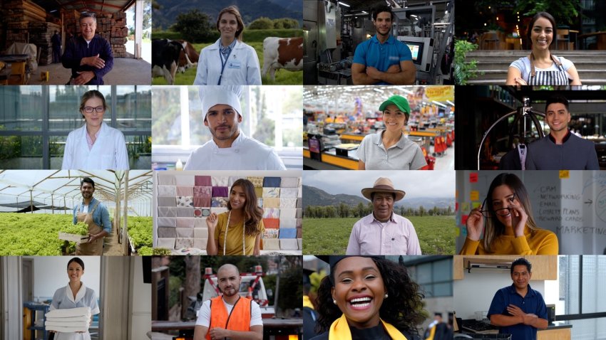 Cheerful and diverse people in various occupations smiling at camera